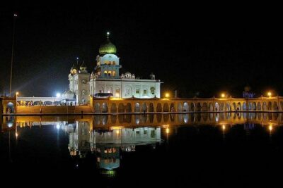 Delhi by Evening Tour with Private AC Car, Guide & Dinner - India Gate at night: a war memorial turned photo stop with meaning