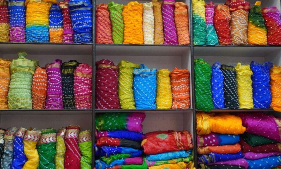 Delhi: Half day Shopping tour with guide by car. - Chandni Chowk: wholesale textiles, electronics, and watches