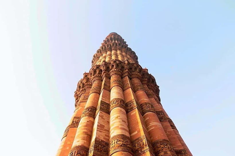 Delhi: Qutub Minar UNESCO World Heritage Site Walking Tour - Quwwat-ul-Islam Mosque: reused pillars and a first-of-its-kind mosque