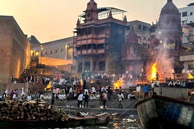 Delhi to Varanasi: Tour to the Sacred Ganga Aarti Ceremony - Manikarnika Ghat at Night: A Serious Moment to Hold Carefully
