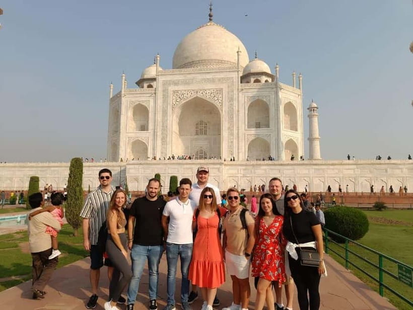 From Delhi: 2 Days Overnight Taj Mahal & Agra Private Tour - Agra Fort first: the Taj Mahal seen from the walls