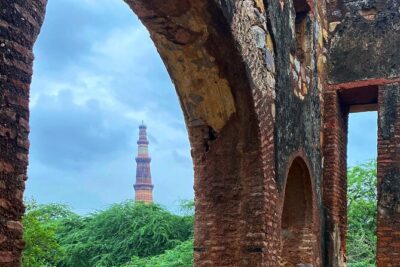 Premium Hidden Jewels of Delhi Cycling Tour - The First Chapter of Delhi - Mehrauli Archaeological Park: honey-stone monuments and the Qutb story