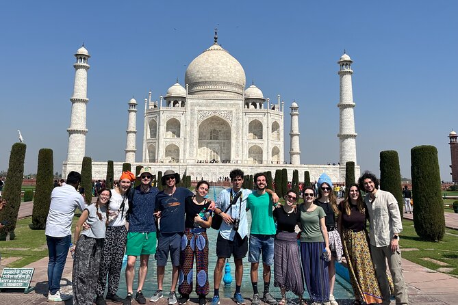 Taj Mahal & Agra Fort Tour from Delhi By Car with 5<em> Lunch – The Guides Make the Difference (From Tickets to Crowd Control)’ /><br />
This is where the day often rises above a basic transport-and-entry package. The tour is driven by your guide, and the best outcomes depend on how well that person handles real-world friction points like security checks, crowd movement, and time management.</p>
<p><p>From the names and examples you’ll see in real-world accounts, you’ll notice a pattern:</p>
</p>
<ul>
<li>Guides like <strong>Owais</strong> are described as helping with tickets, explaining what you’re looking at, and even taking great photos.</li>
<li><strong>Nashit</strong> is praised for guiding passengers smoothly and dealing with tricky rule issues, like when someone brought a laptop that wasn’t allowed and needed help figuring out what to do.</li>
<li><strong>Aqib</strong> stands out for sharing history and making photo moments easier.</li>
<li><strong>Abdul</strong> is repeatedly mentioned for being friendly, while also keeping the driving and overall flow calm.</li>
<li><strong>Zeeshan</strong>, <strong>Rashid</strong>, and <strong>Azar</strong> come up for clear explanations, helpful pacing, and making it feel like you saw the whole story rather than just the highlights.</li>
<li><strong>Amir</strong> is noted for tailoring the visit to the needs of the group and keeping the experience comfortable, especially for women traveling.</li>
</ul>
<p><p>What you should take from this: you’re not just buying entry tickets. You’re paying for someone to translate the site while also solving day-of problems.</p>
</p>
<p><p>And yes, many guides help with photos. Don’t expect magic without effort, but if you care about capturing the Taj Mahal properly, a guide who knows good positions and how to manage brief crowd gaps can change your results.</p>
</p>
<h2 id="price-and-value-32-50-per-person-but-what-youre-really-buying">Price and Value: $32.50 Per Person, But What You’re Really Buying</h2>
<p><img width="669" height="446" decoding="async" src=
